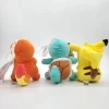 Charmander, Pikachu and Squirtle Plushie Back